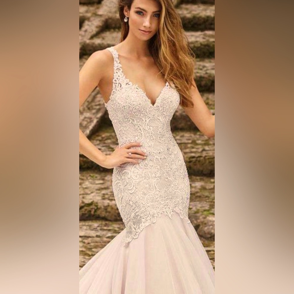 UK size 14 US size 10 halter style bridal gown with a cathedral length train.